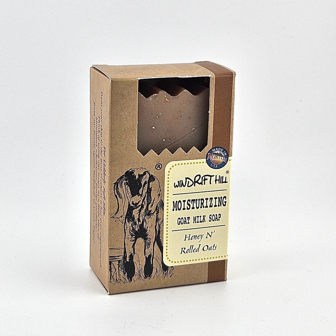Box of Windrift Hill moisturizing goat milk soap on a gray background
