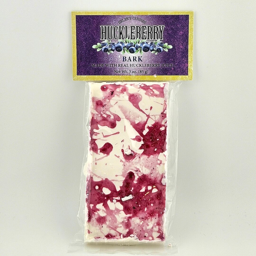 Huckleberry bark product with purple packaging on a white background