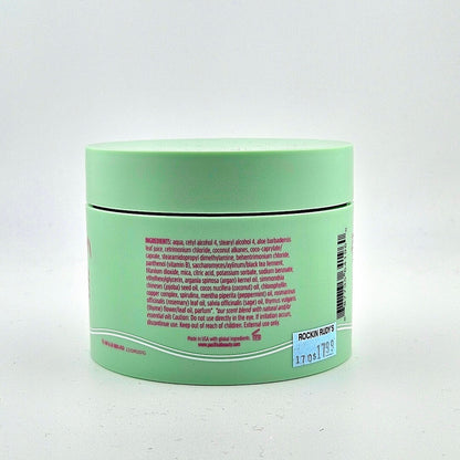 Green jar with text on a white background