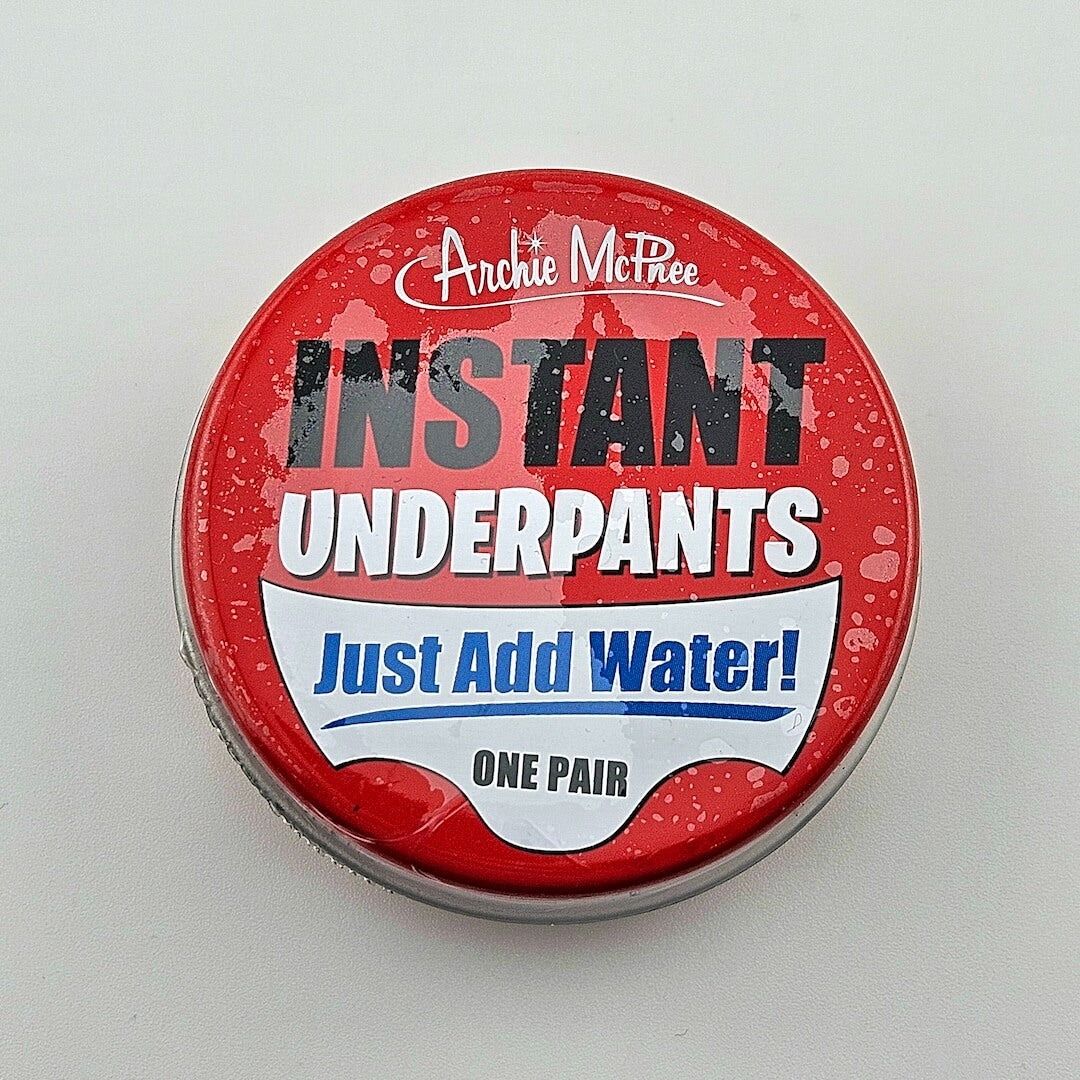 Red container labeled 'Instant Underpants' with Archie McPhee branding on a white background
