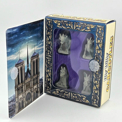View inside packaging for Itty Bitty Gargoyles against gray background. 