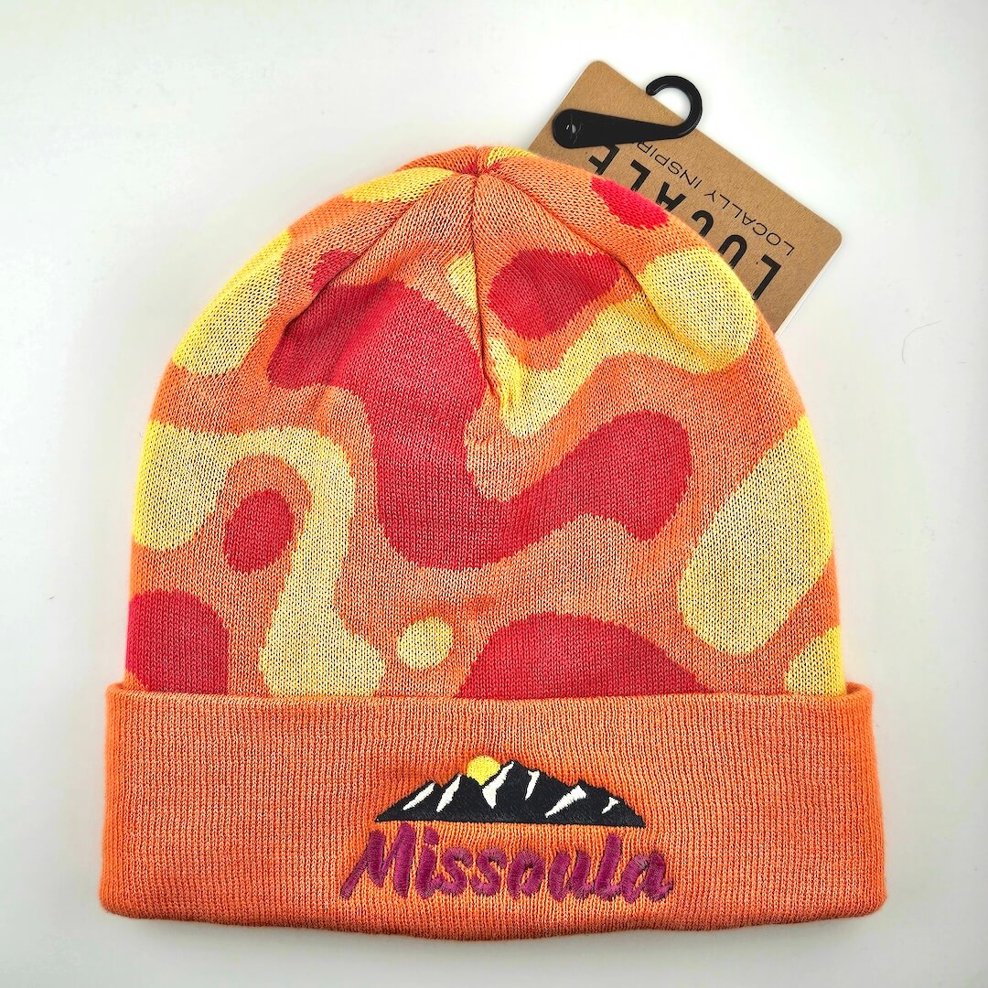 lava lamp-patterned beanie with 'Missoula' embroidery on a white background