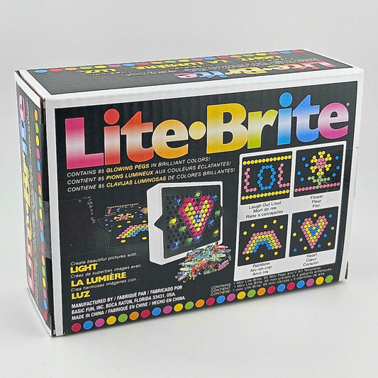 Box of Lite-Brite toy on a gray background