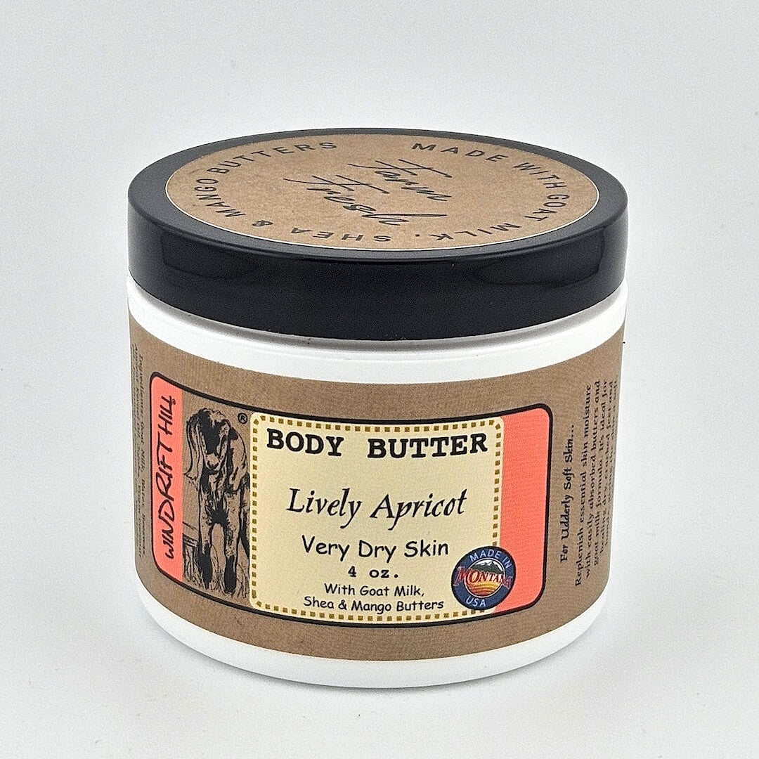 Body butter jar labeled 'Lively Apricot' on a gray background
