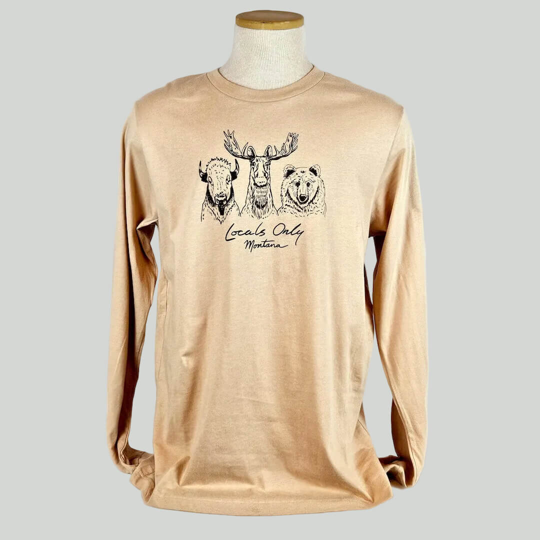 Beige long-sleeve shirt with animal graphics and text on a mannequin against a white background