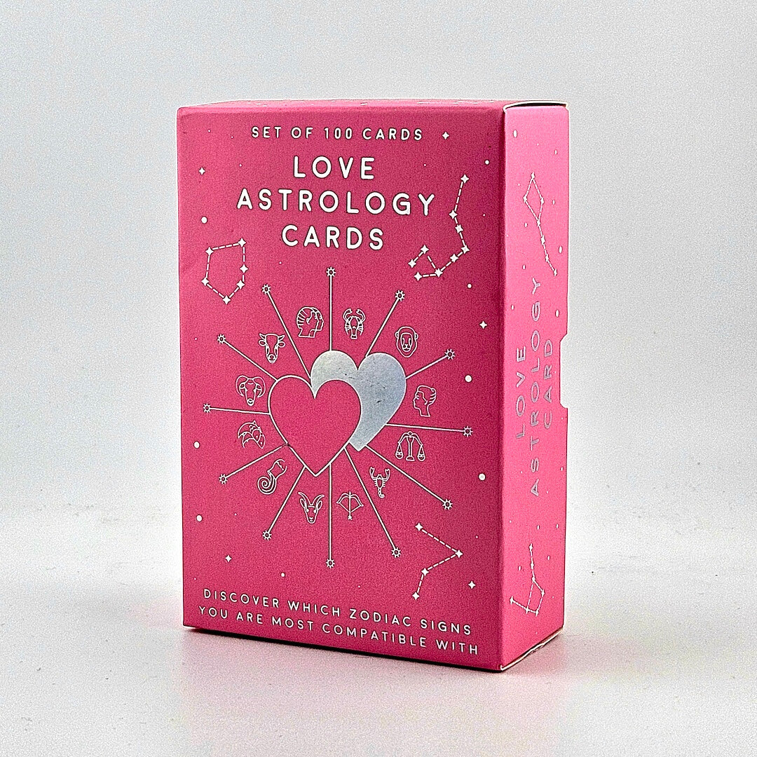 Pink box of Love Astrology Cards with heart and zodiac symbols on a white background