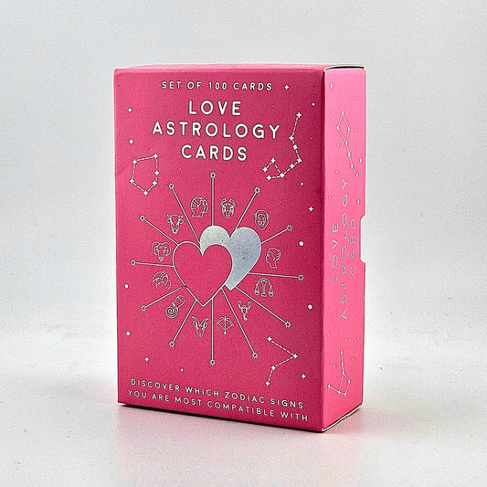 Pink box of Love Astrology Cards with heart and zodiac symbols on a white background