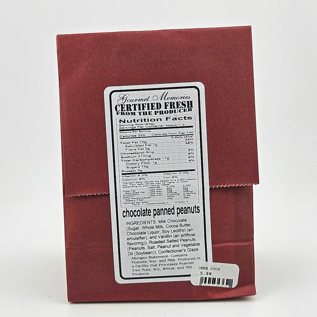 Back of red paper bag with white sticker listing nutrition facts & ingredients in black print.