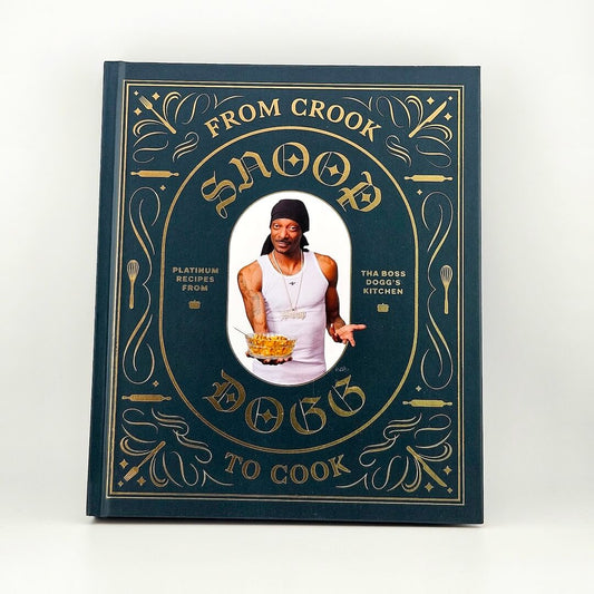 Cover of Snoop Dogg's cookbook against white background. 