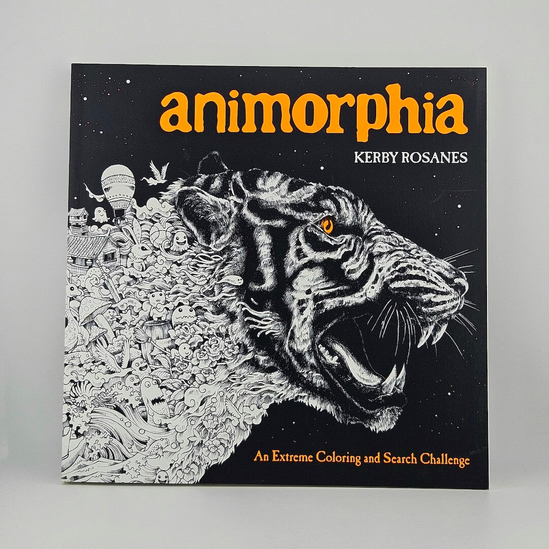 Cover of coloring book with tiger face and orange title. 