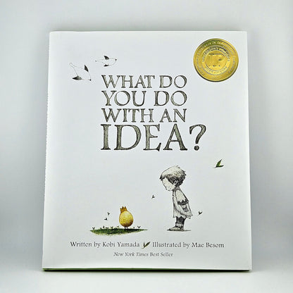 White hardcover book with child illustration under title, against white background. 