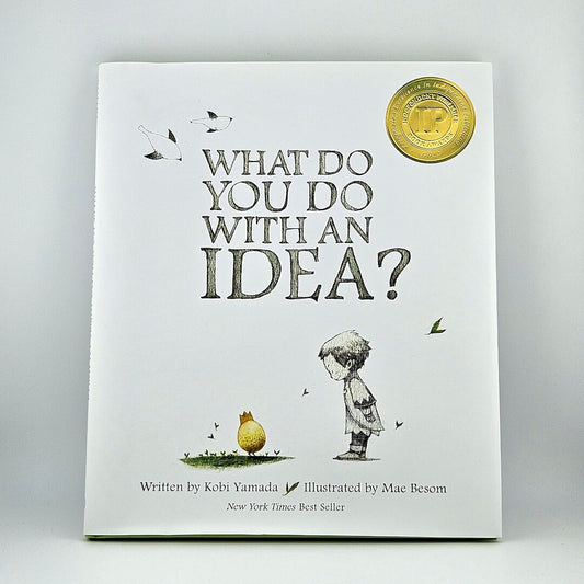 White hardcover book with child illustration under title, against white background. 