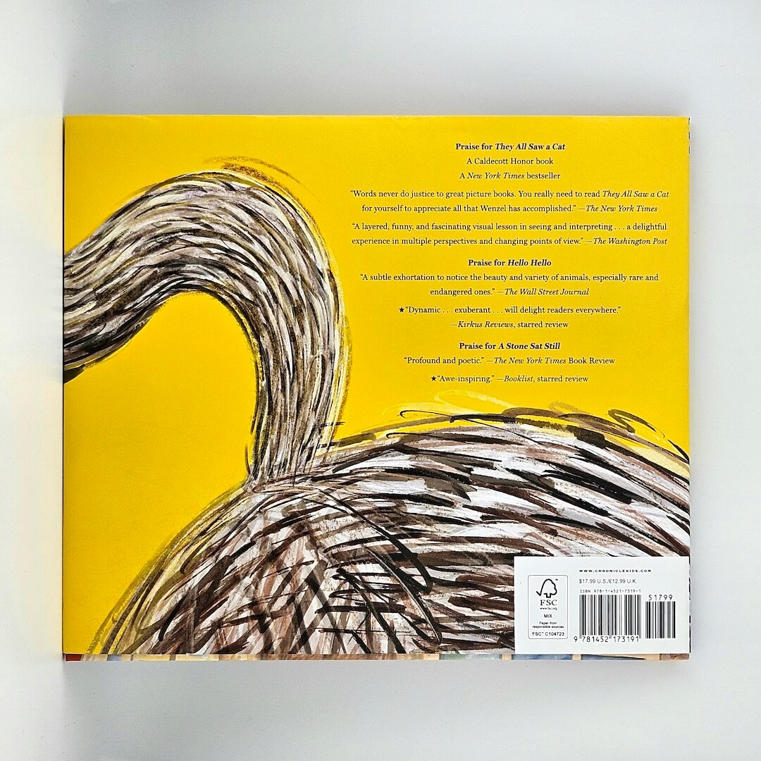 backside of yellow hardcover book titled "Inside Cat" by Brendan Wenzel. 
