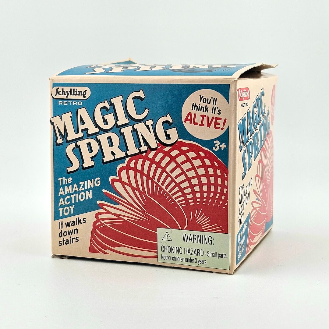 Box of Schylling Magic Spring toy on a light gray background