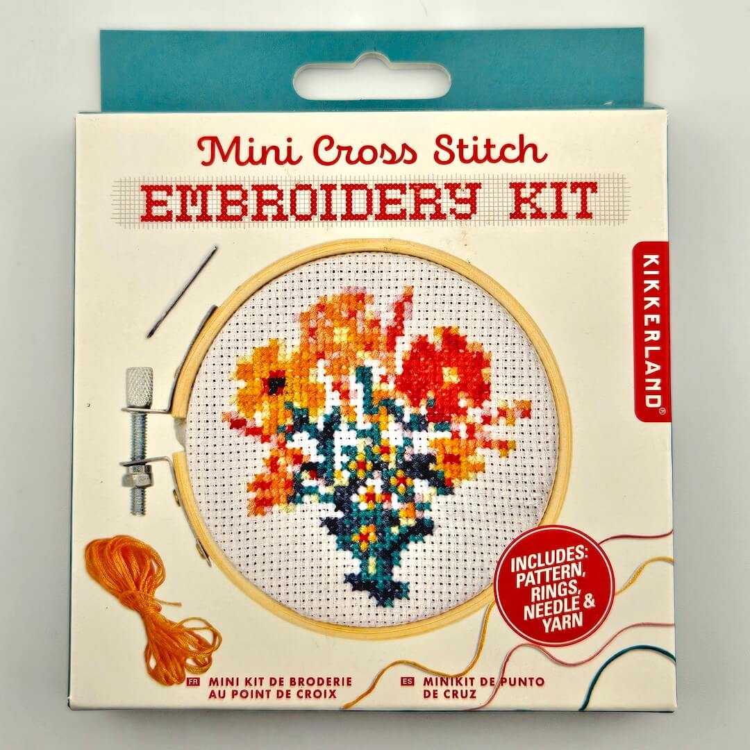 Kikkerland Mini Cross Stitch Embroidery Kit packaging with floral design