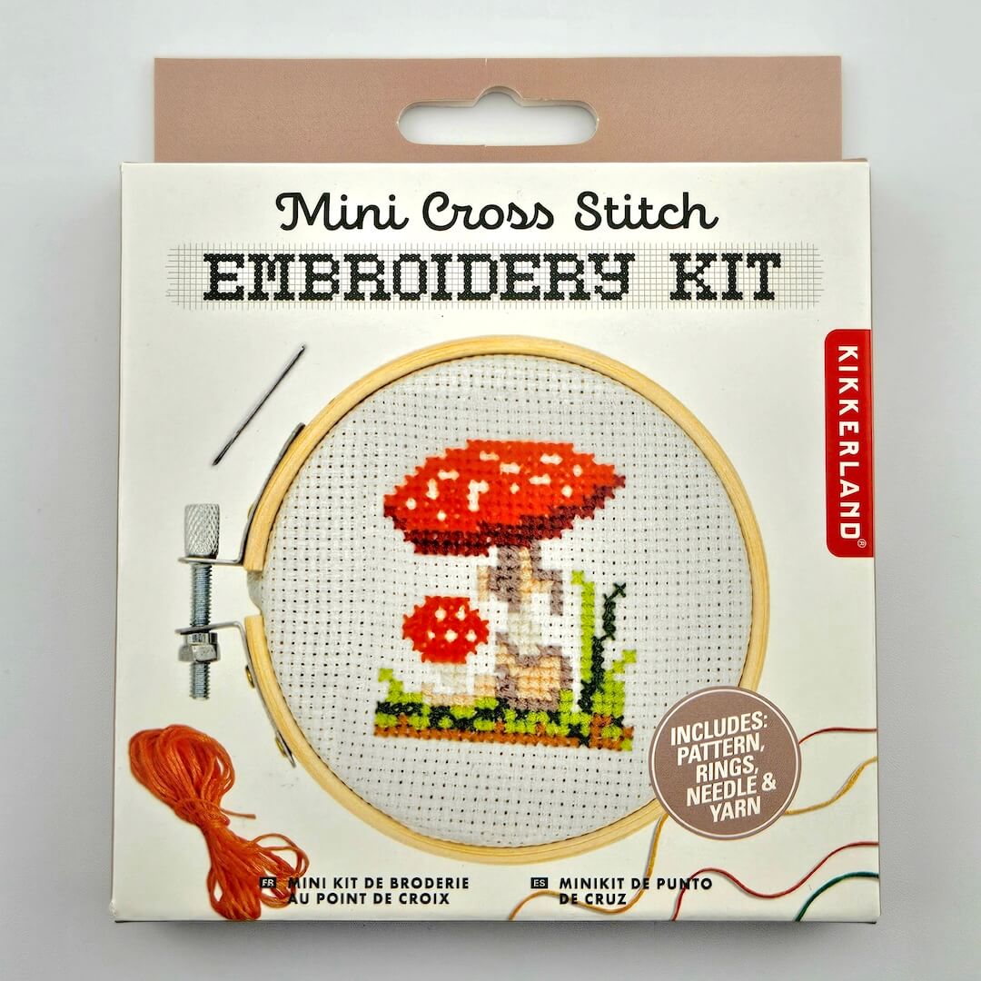 Kikkerland Mini Cross Stitch Embroidery Kit packaging with mushroom design
