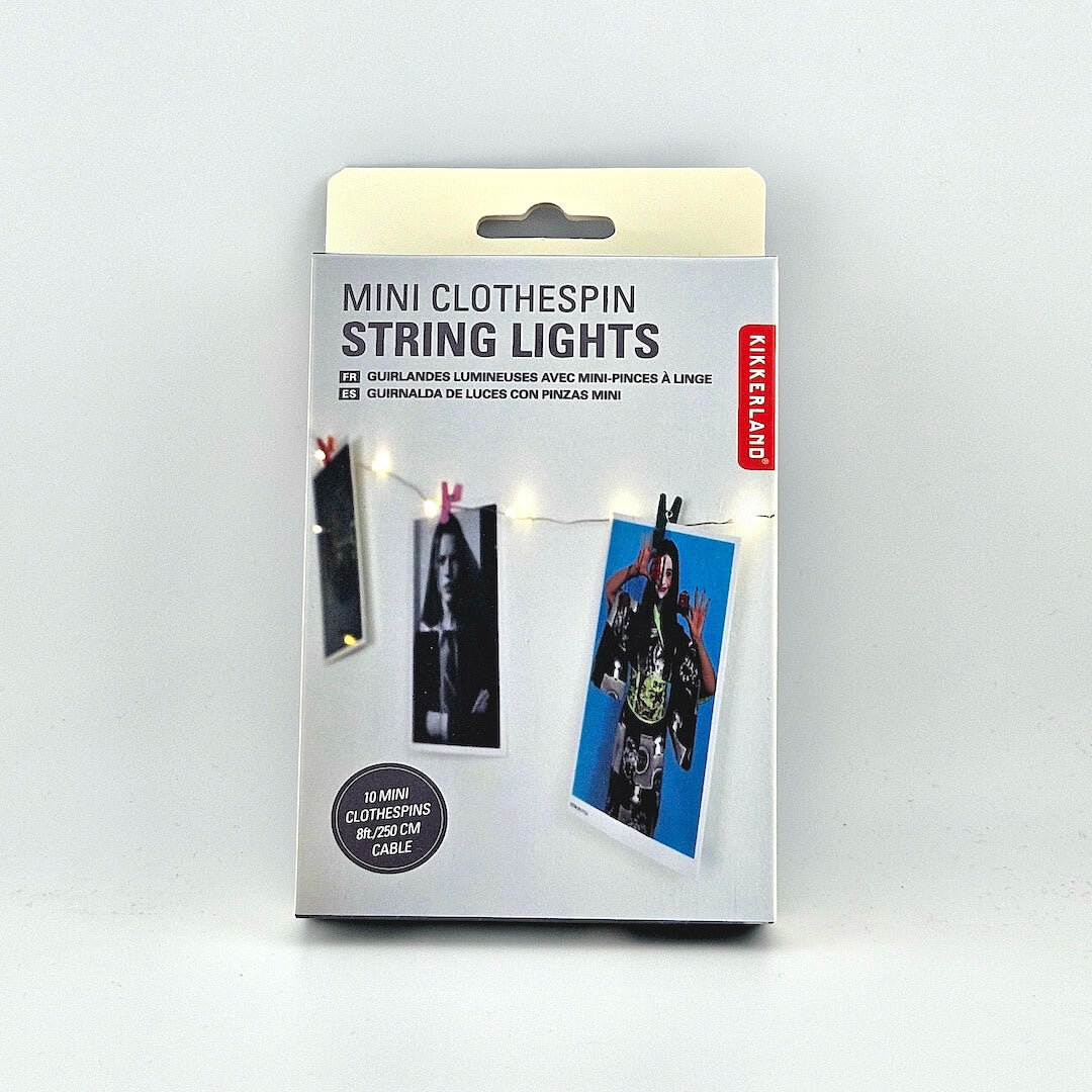 White box with string lights image on front and red branding against white background.