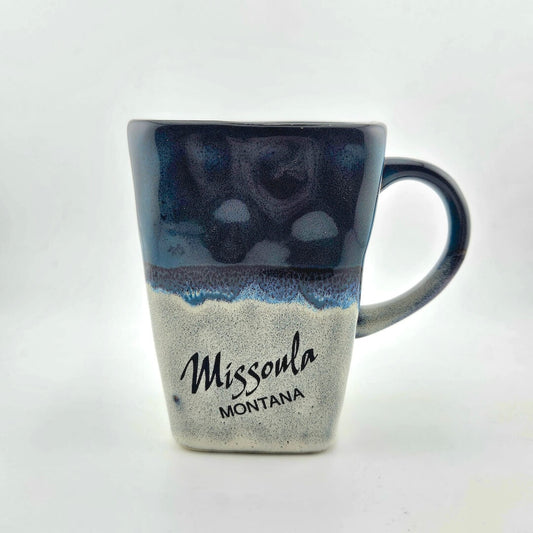 Mug with blue and white design and 'Missoula Montana' text on a white background