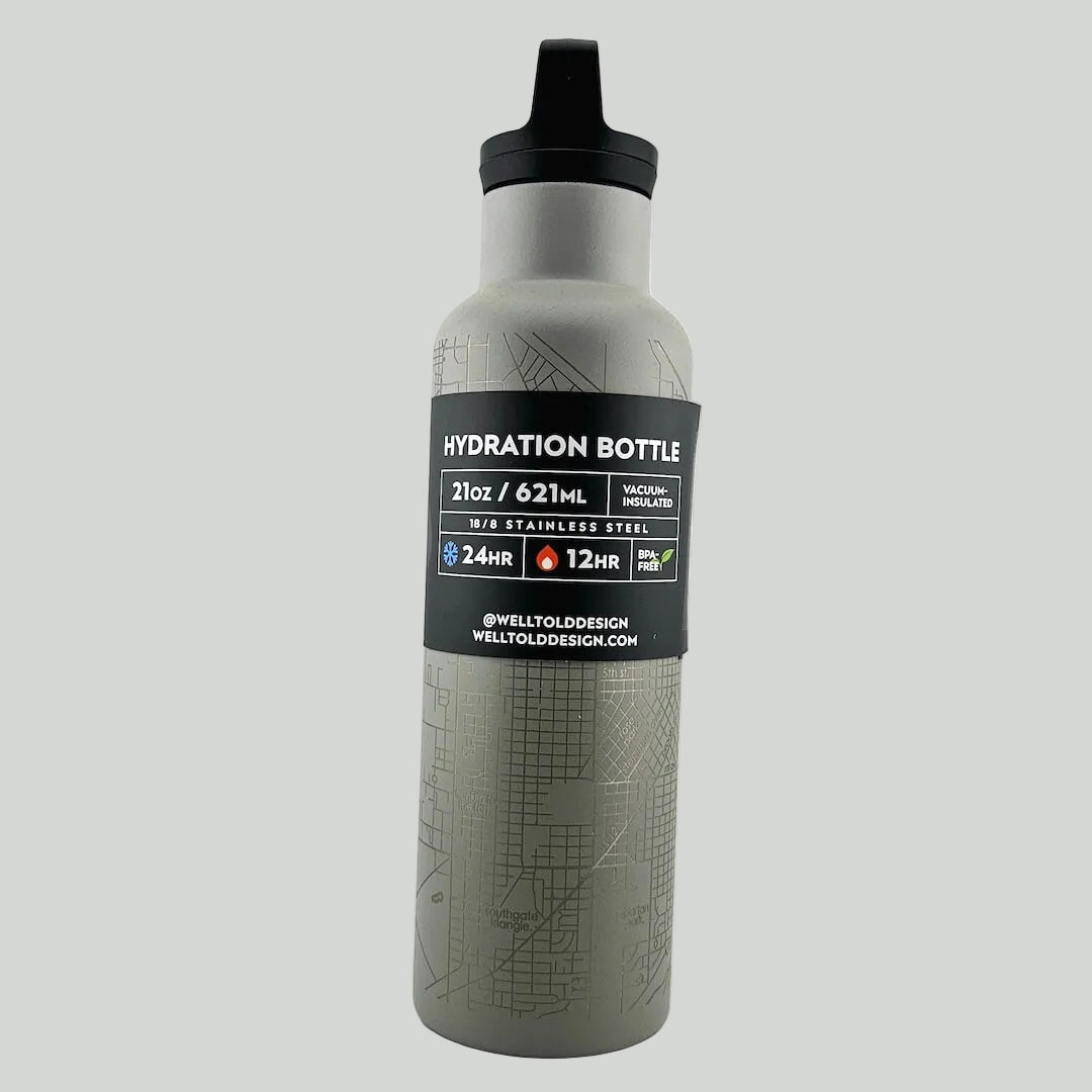 Gray hydration bottle with black label on a white background