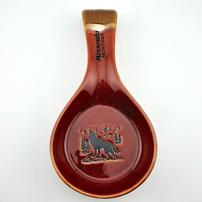 Ceramic spoon rest with engraved design and 'Missoula Montana' text on a white background