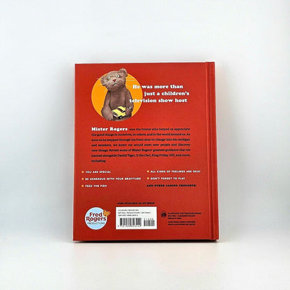Back cover of a book with a red background featuring a cat illustration and text.