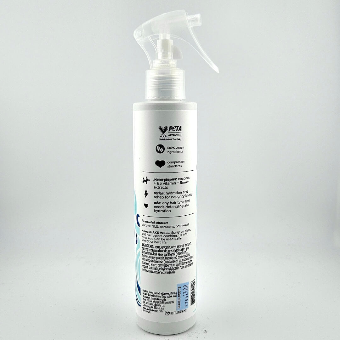 White spray bottle with label on a gray background