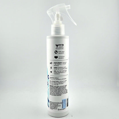White spray bottle with label on a gray background
