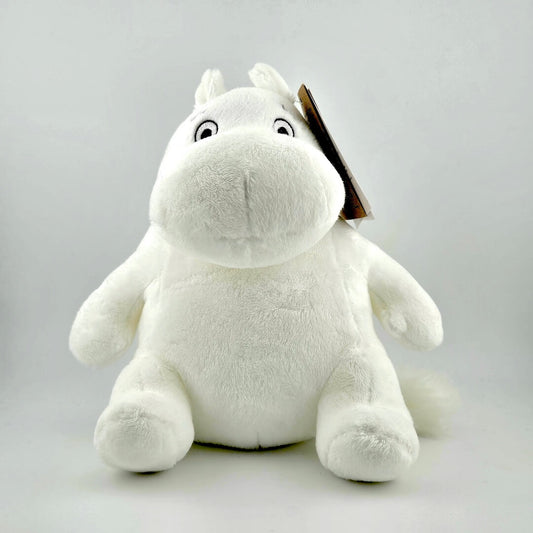 White horse-like plush animal against white background.
