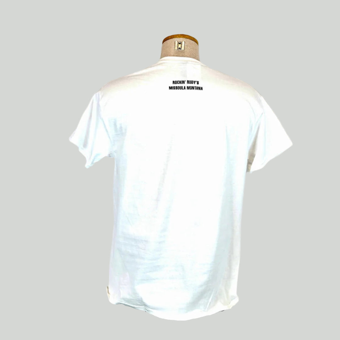 White t-shirt on a mannequin with 'Rockin' Rudy's, Missoula, Montana' text on a white background