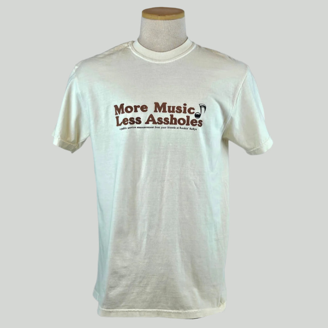 Light tan t-shirt with brown text on a mannequin against a gray background