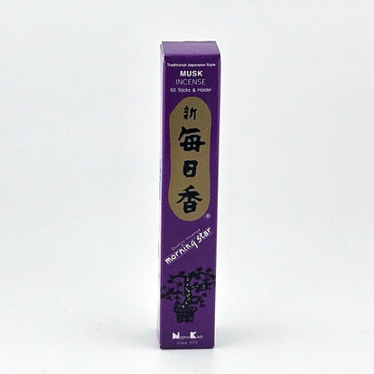 purple box of 50 incense sticks with Japanese writing above bonsai tree packaging on gray background.