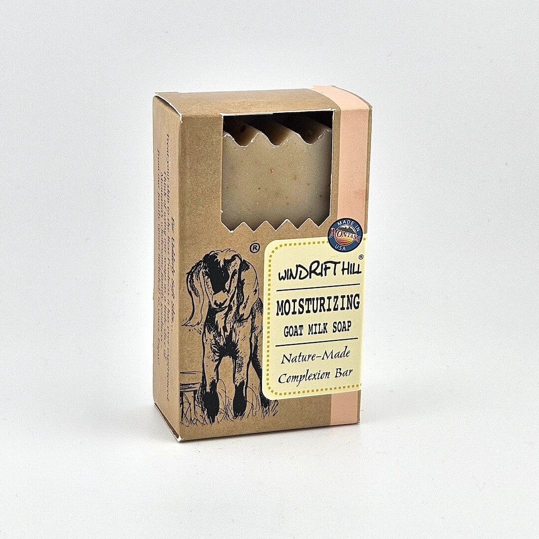Box of Windrift Hill moisturizing goat milk soap on a gray background