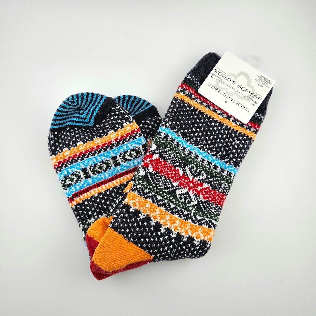 Pair of colorfully patterned socks against light gray background.