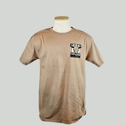 Beige t-shirt with a cow skull graphic on breast on a mannequin against a white background