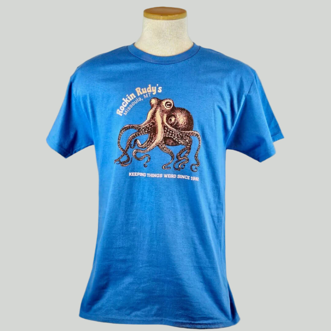 Blue t-shirt with an octopus graphic and text on a mannequin against a plain background