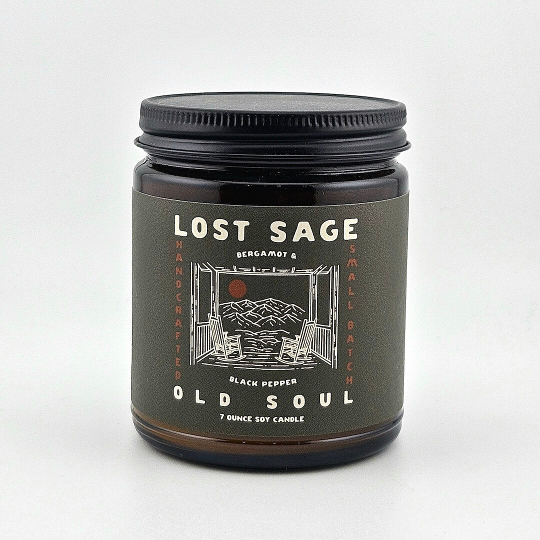 Candle jar labeled 'Lost Sage, Old Soul' on a white background