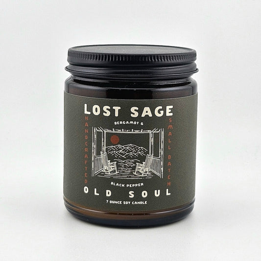 Candle jar labeled 'Lost Sage, Old Soul' on a white background