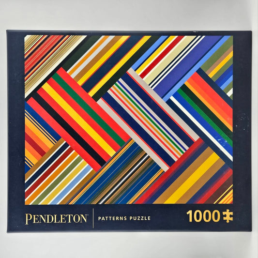 Pendleton Patterns Puzzle packaging with colorful geometric design on a gray background