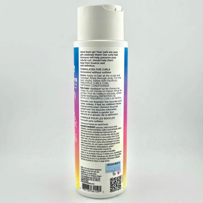 Back label of a shampoo bottle on a gray background