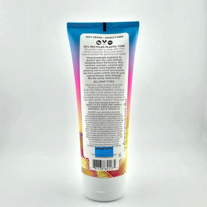 Backside of squeeze bottle with text for instructions and ingredients against white background.