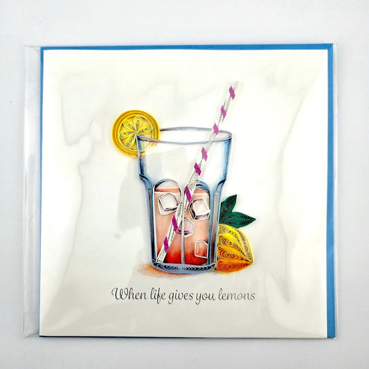 Card with a glass of lemonade and lemons on a white background