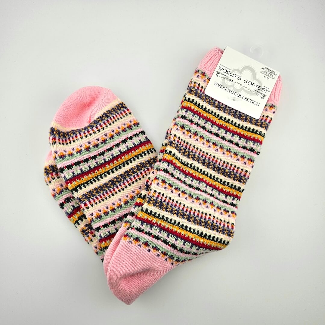 Colorful patterned socks with pink accents on a gray background