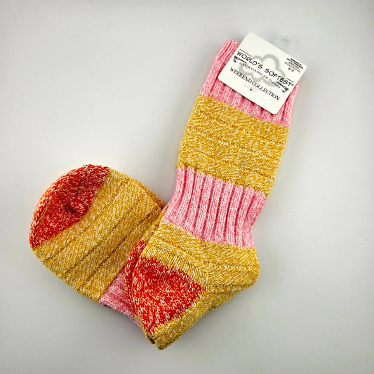 Pair of brightly colored socks with visible brand label against light gray background.