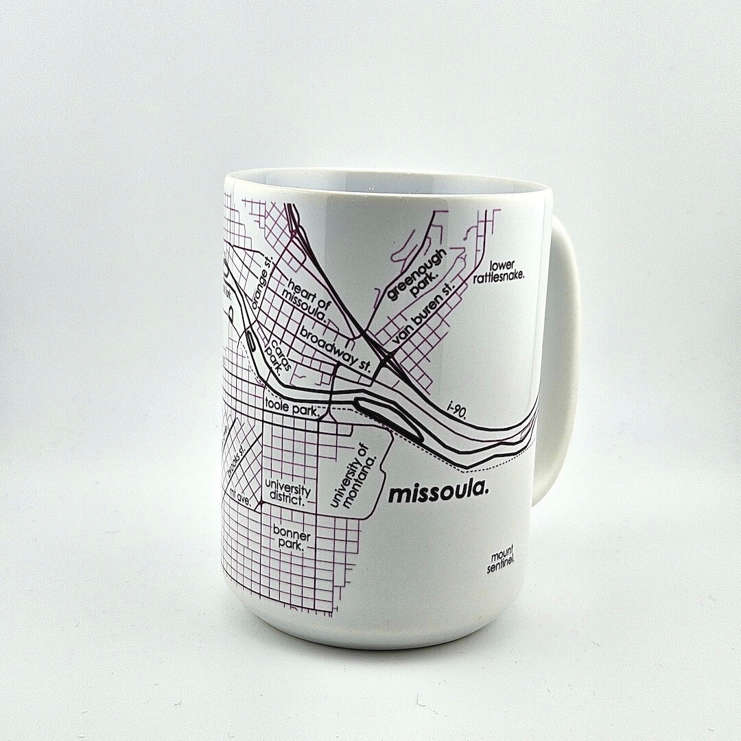 White mug with black map design on a white background