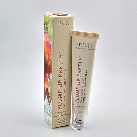 Farmshouse Fresh 'Plump Up Pretty' lip treatment tube and packaging on a gray background