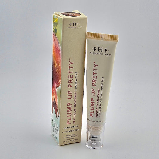 Farmshouse Fresh 'Plump Up Pretty' tube and box on a gray background