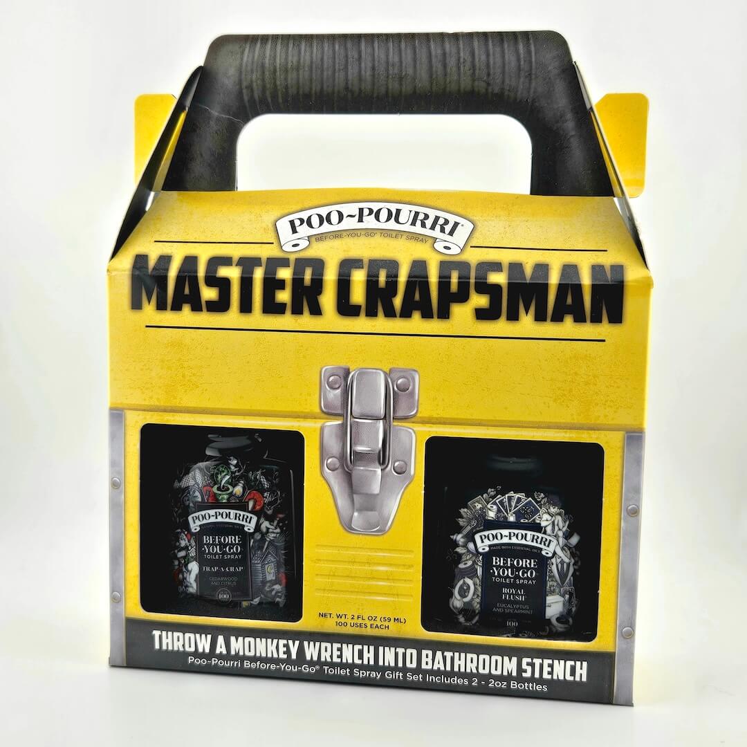 Poo-Pourri Master Crapsman packaging with two bottles and a handle on a white background