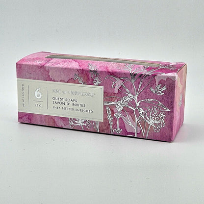 Box of six guest soaps with floral design on a white background