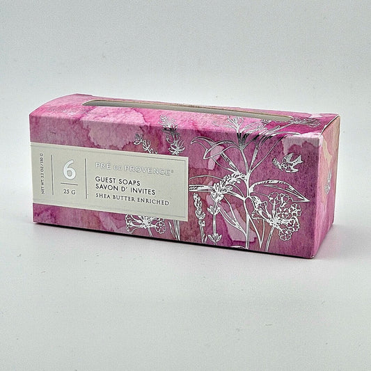 Box of six guest soaps with floral design on a white background