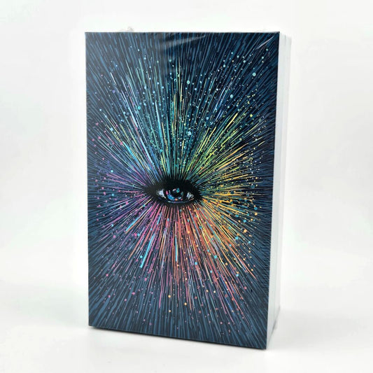 Tarot deck with eye in center with colorful rays emanating from it. 